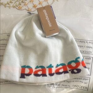 Patagonia womens Cream Beanie with Multicolor Logo